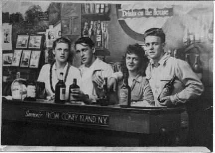 Bill at "bar" with friends (Peggy far left, Jim Burns far right)