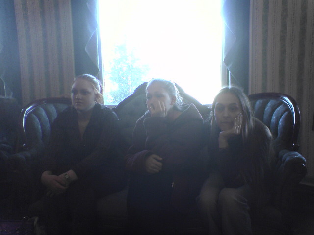 3 granddaughters waiting in funeral parlor